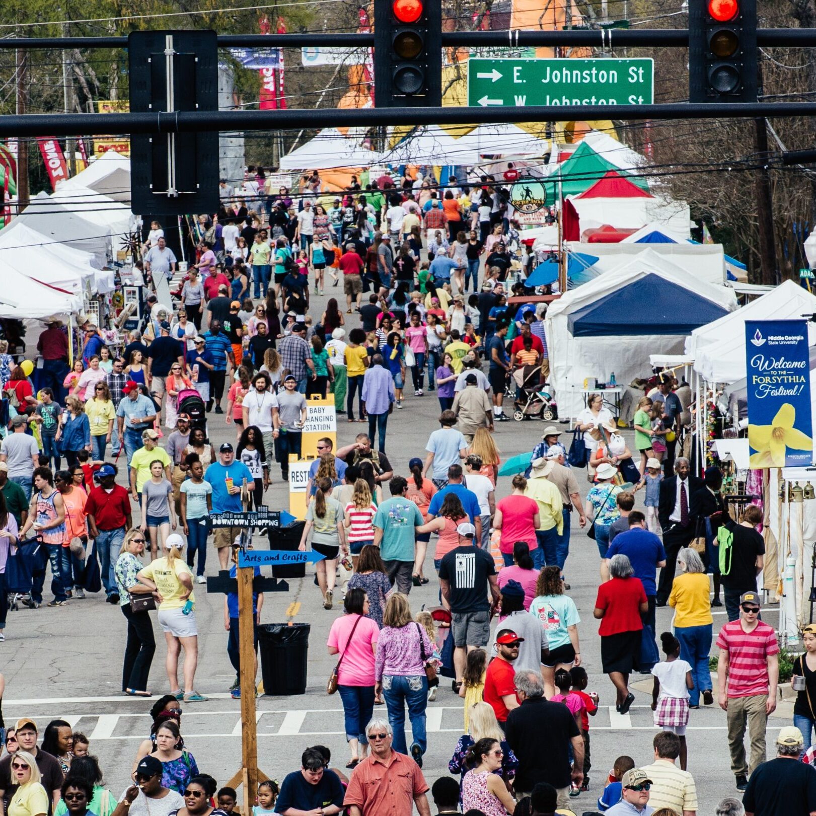 block party with tents and vendors