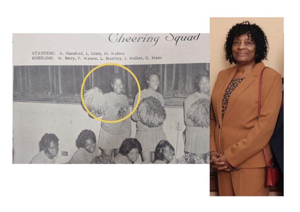 Black woman with shoulder length black curly hair wearing a light orange suit next to a yearbook photo of her cheerleading squad