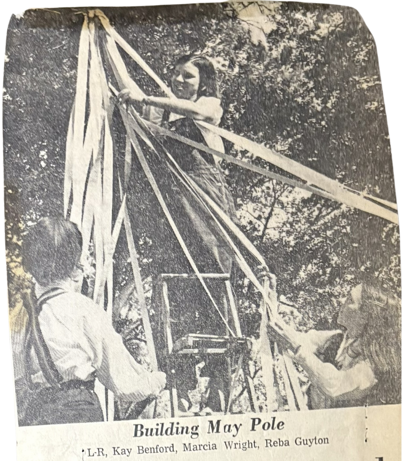 An image building the May Pole at Tift College 
