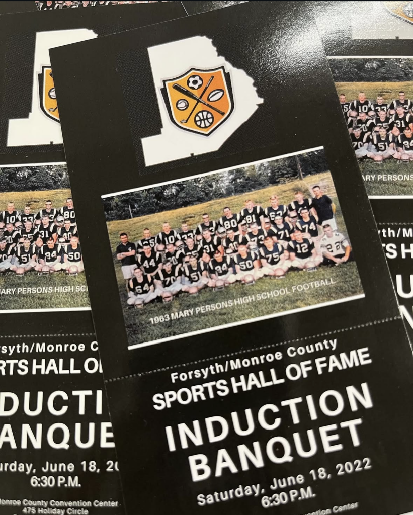 tickets for sports hall of fame fanned out on a table