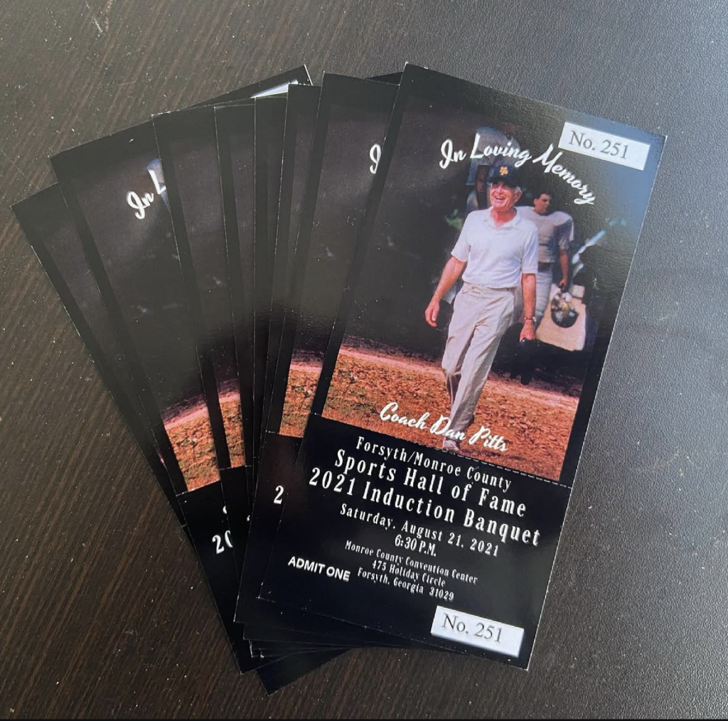 tickets for sports hall of fame fanned out on a table