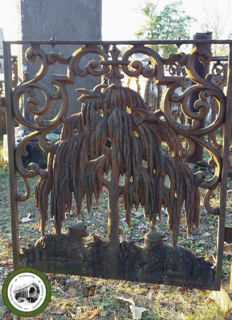 close up of a gate of a family burial plot