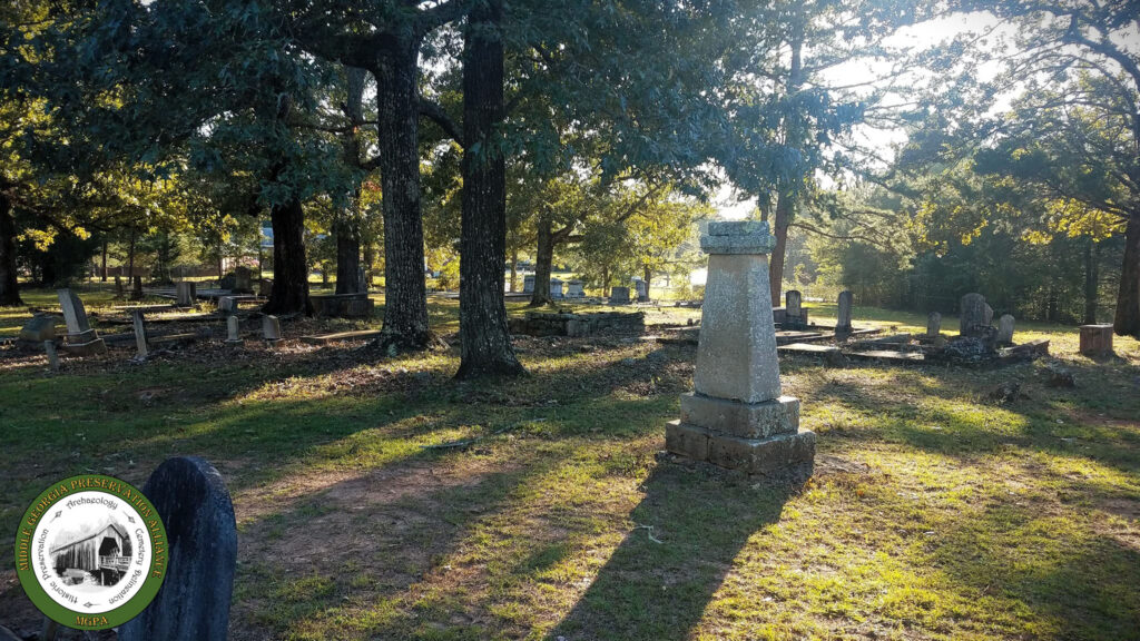 grave monuments among trees